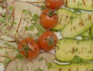 Zucchini and egg plant fresh from the grill, decorated with sweet ripe Pachino tomatoes and seasoned with extra virgin olive oil. Simple recipe, fantastic taste!