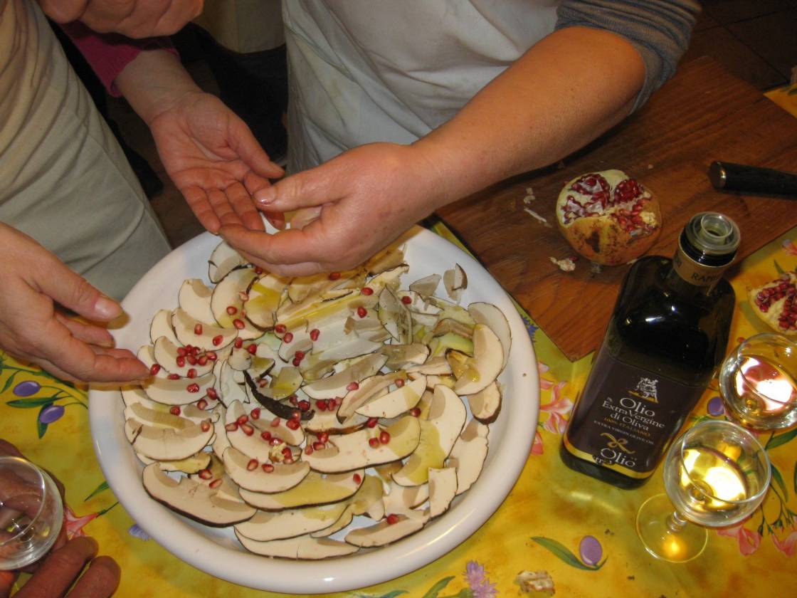 Carpaccio of edible boletus with pomgranate seeds