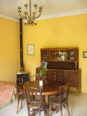 Kitchen at La Nostalgia, with antique furniture and porcelaine Italian style.